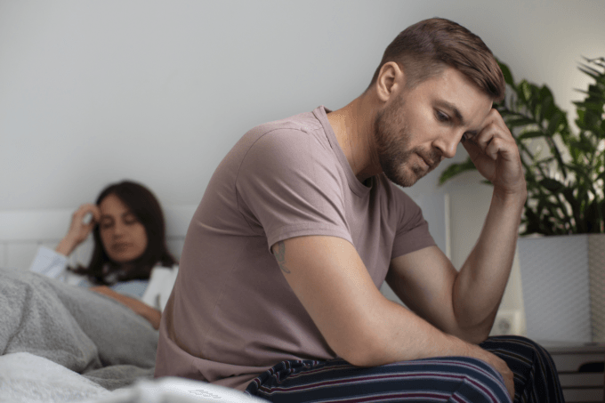 Man reflecting on infertility