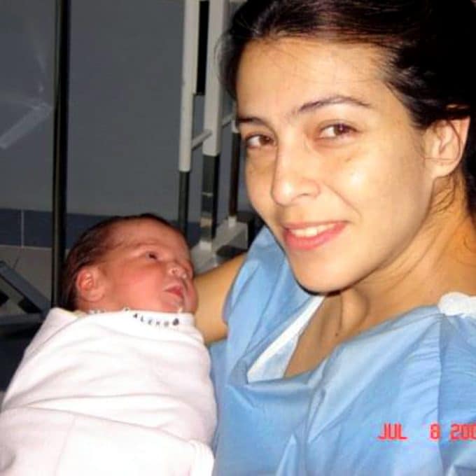 infertility-problem-mother-infertility-breast-feeding-denisse-older-woman-carrying-her-baby-who-had-in-vitro-fertilization